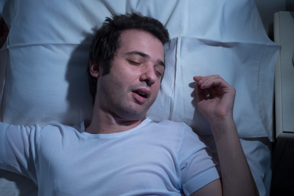 Man sleeping bed
